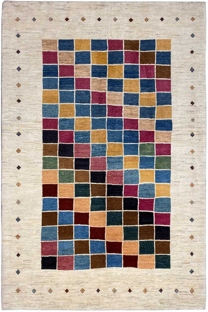 Gabbeh rug 245×169 cm with a multicolored square pattern on a light background