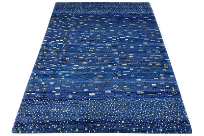 Gabbeh rug, blue patterned, dense texture, with a border all around