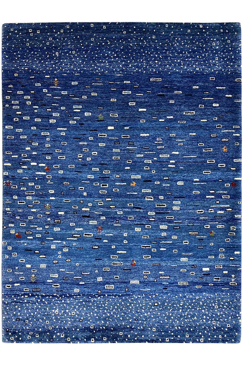 Gabbeh rug with a blue pattern and fringes all around
