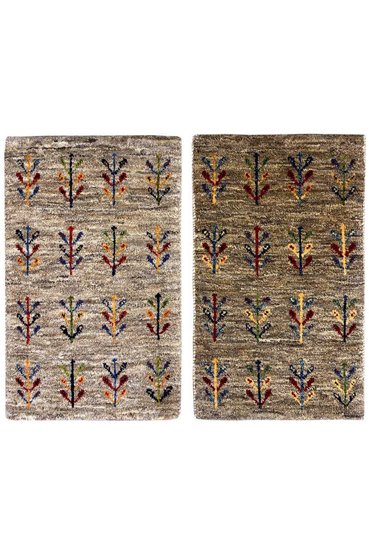 Gabbeh rug 40x60 cm with a beige background and colorful vine pattern, front view
