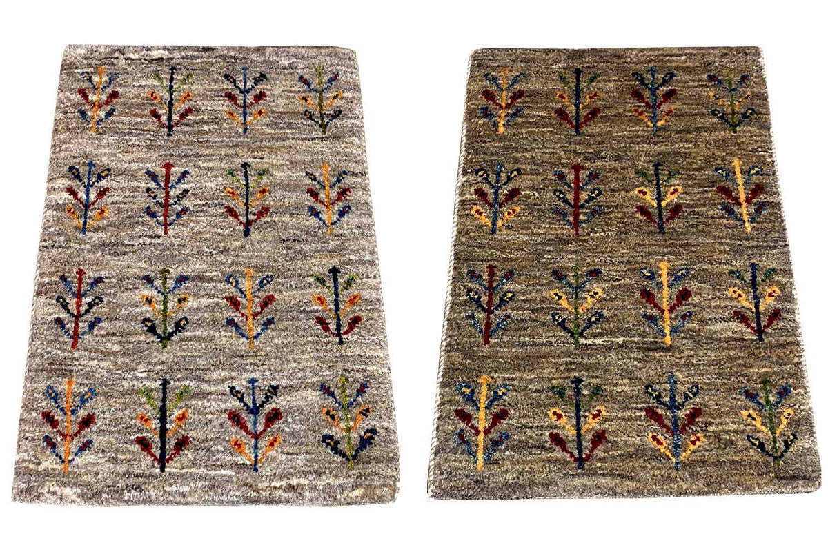 Gabbeh rug 40x60 cm with a beige background and colorful vine pattern, front view