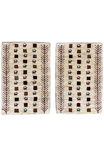 Gabbeh rug, cream-colored with a square pattern and red decorative borders