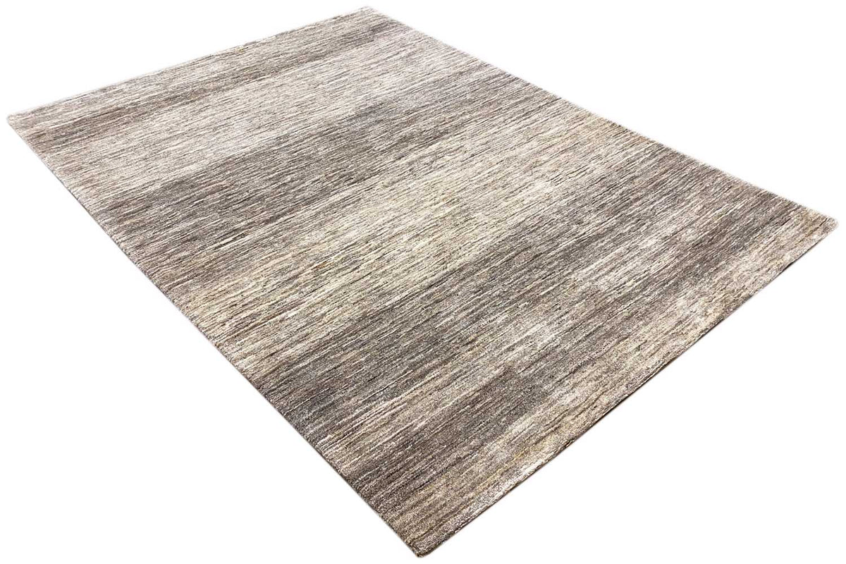 Gabbeh rug, diagonal view, mottled beige-gray with fine line textures