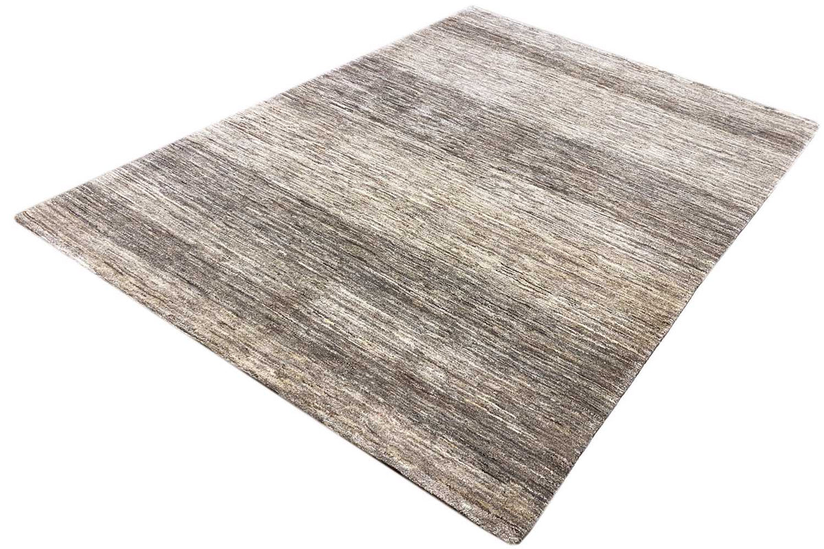 Gabbeh rug, diagonal view, mottled beige-gray with clear, calm lines