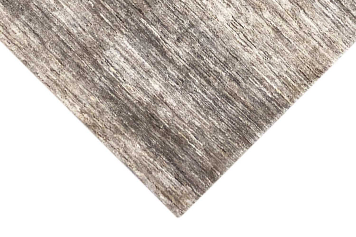 Gabbeh rug, diagonal view, beige-gray pattern with contrasting lines