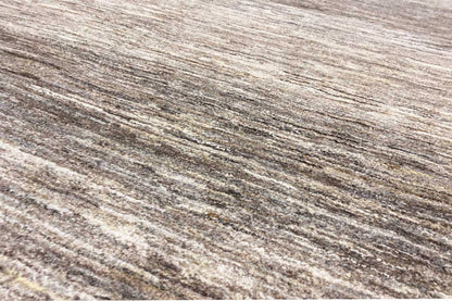 Gabbeh rug, surface detail, beige and gray mottled with a fine elongated texture