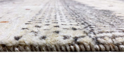 Gabbeh rug: detailed pile and fiber structure with short, dense fringes