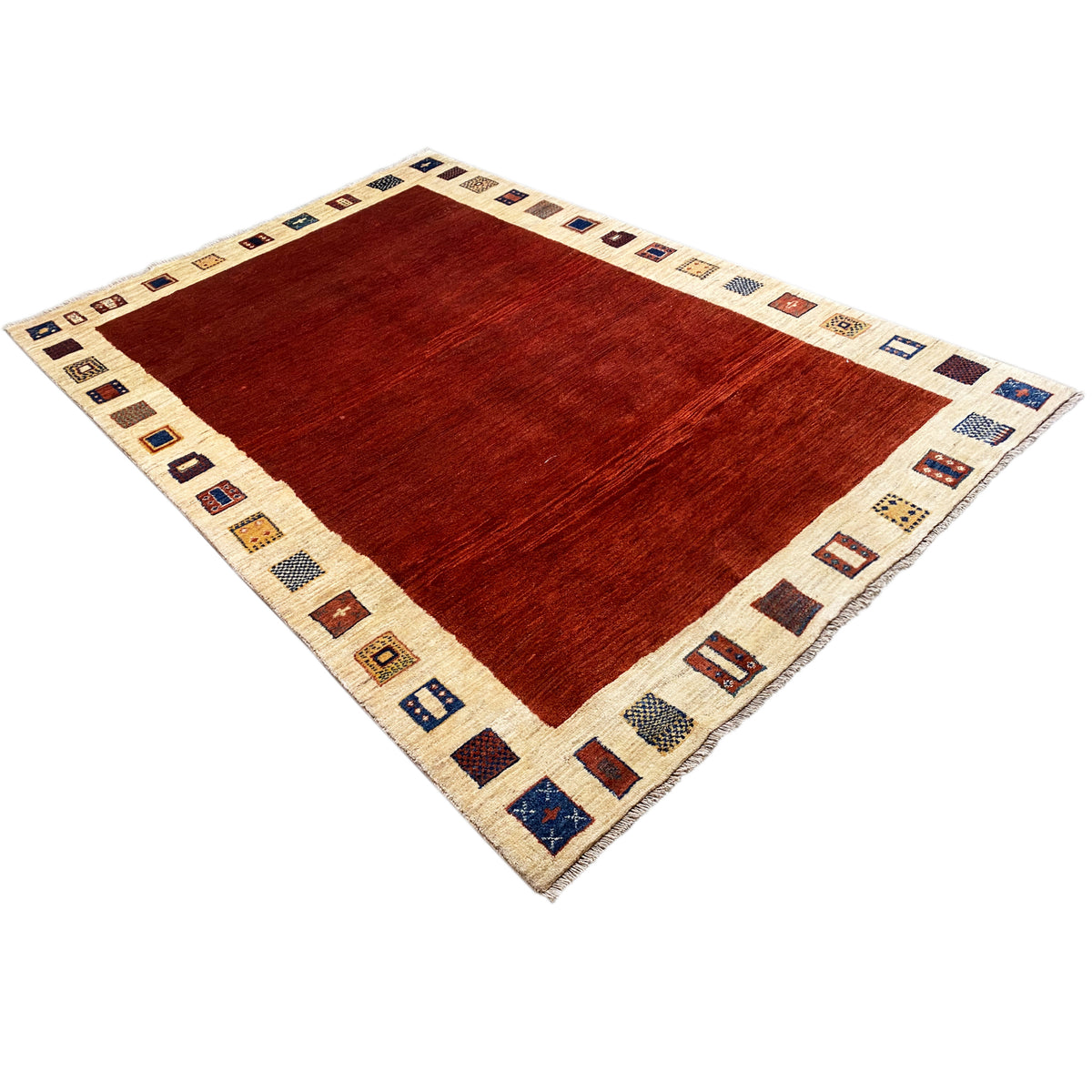Gabbeh rug, rectangular: deep red field pattern, beige border with square ornamental motifs