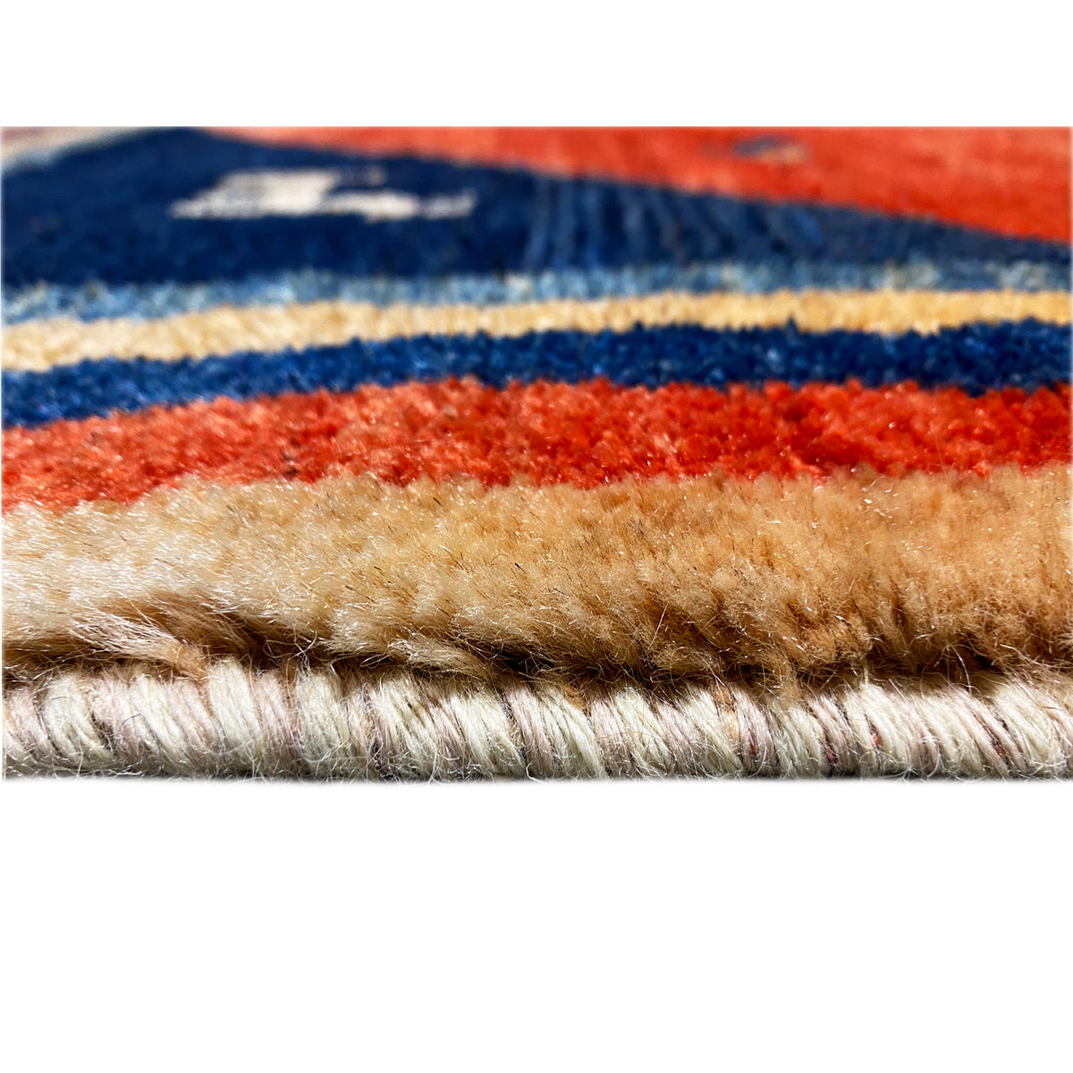 Rug edge with fringe, red-blue-yellow striped border