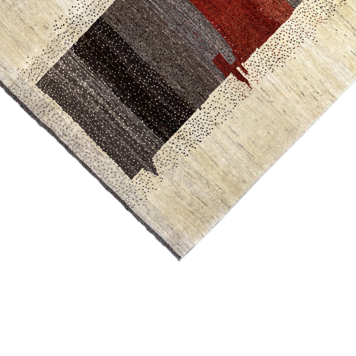 Gabbeh rug corner with a surrounding beige border and geometric stripes