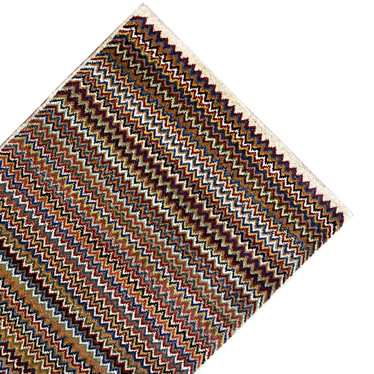 Gabbeh rug 130x75 cm, laid diagonally: zigzag stripes in brown, blue and orange/red.