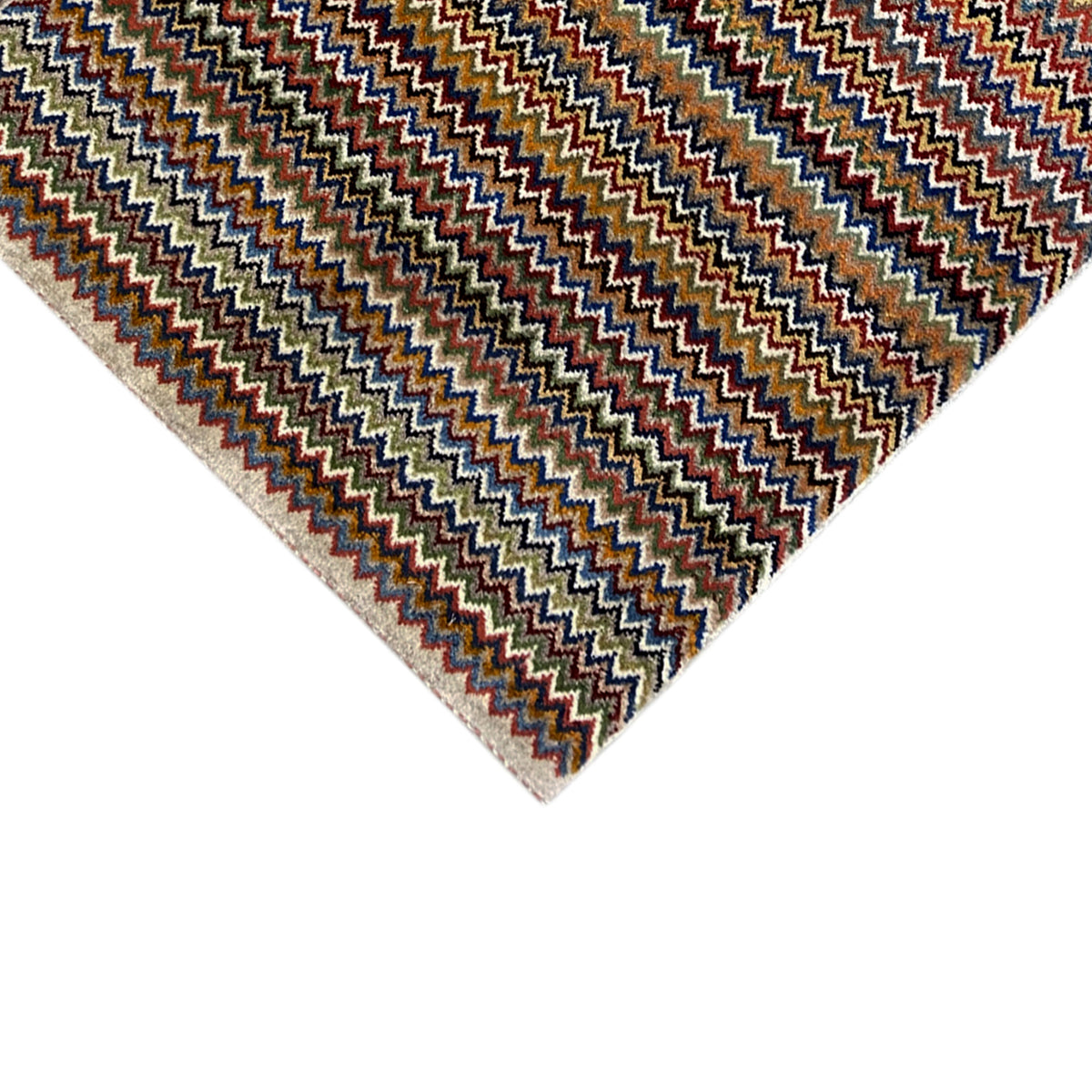 Gabbeh rug 130x75 cm Detail: Zigzag pattern in blue, brown, and beige with a bordered edge.