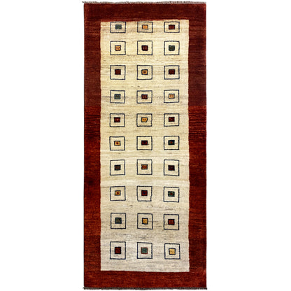 Runner rug with a cream-colored field and brown border, featuring a square pattern