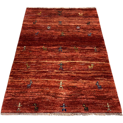 Gabbeh rug 140x93 cm, reddish brown, wide-striped texture with colorful motifs