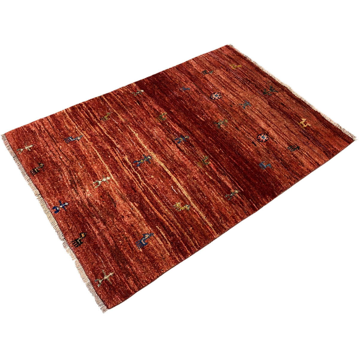 Gabbeh rug 140x93 cm, reddish-brown woven pattern with colorful dots and fringed edges
