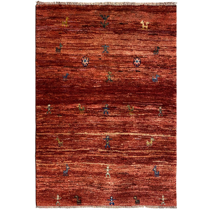 Gabbeh rug 140x93 cm with a reddish-brown mélange field and colorful patterns