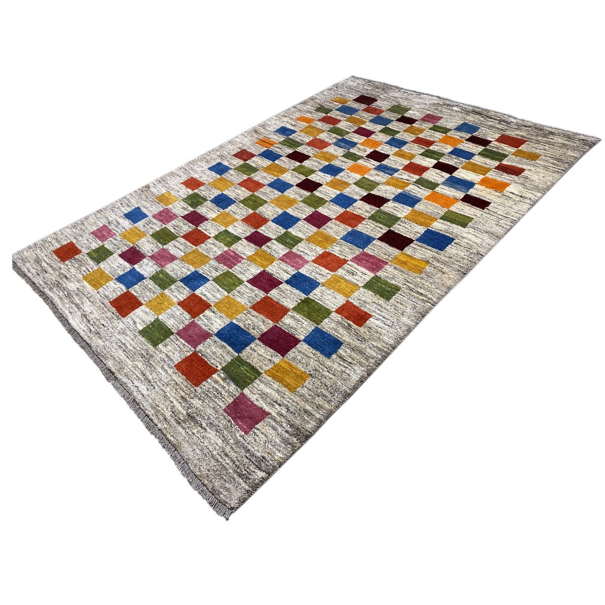 Gabbeh rug with a beige background and colorful diamond and cube pattern