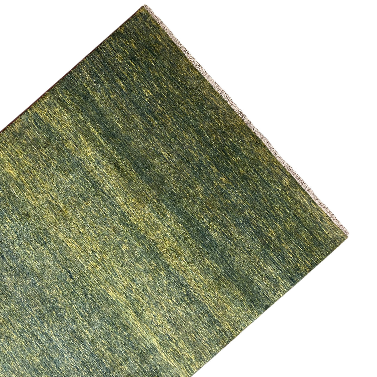 Gabbeh rug angled view, green mottled surface, calm overall impression