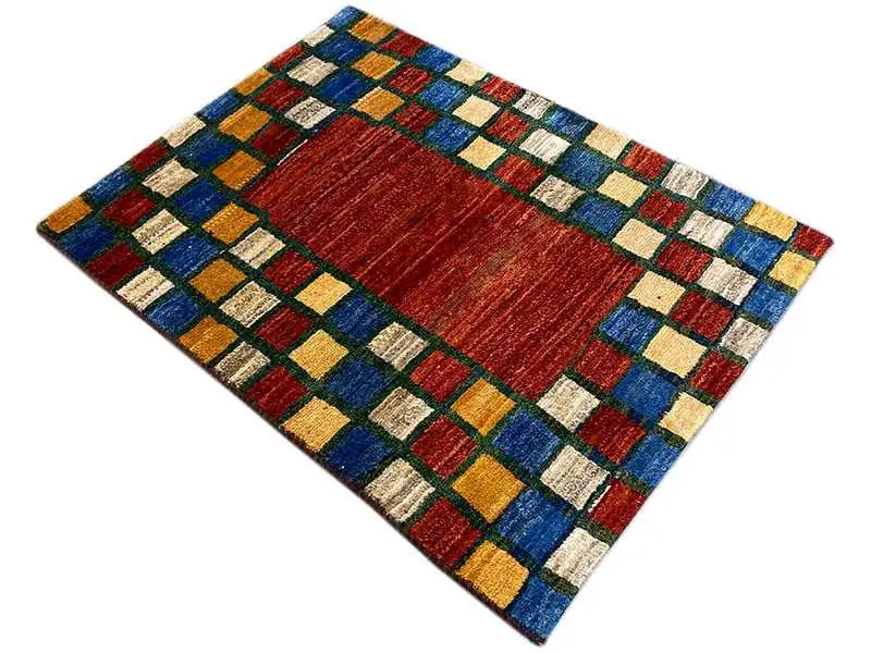 Rug, flat-laying: red center with a multicolored square border frame