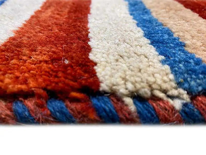 Carpet pile in close-up, colorful stripes with a short, dense surface