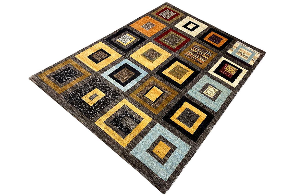 Gabbeh rug with a geometric quadrilateral pattern in black, yellow, gray, and blue