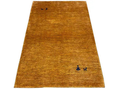 Gabbeh rug 154x96 cm, yellow-brown with small blue-black motif appliqués