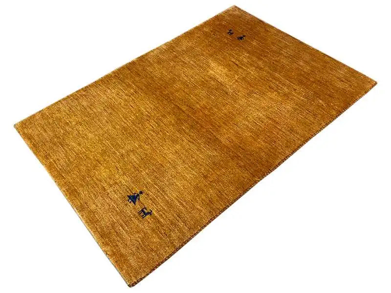 Gabbeh rug 154x96 cm, yellow-brown with dark and blue decorative motifs in the corners