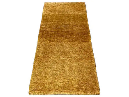Gabbeh rug 131x62 cm, mustard-gold short pile with a simple surface