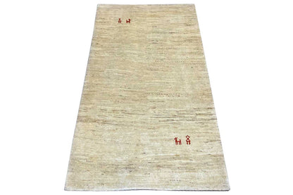 Beige Gabbeh rug with a red symbolic pattern, elongated rectangular, approx. 133×82 cm