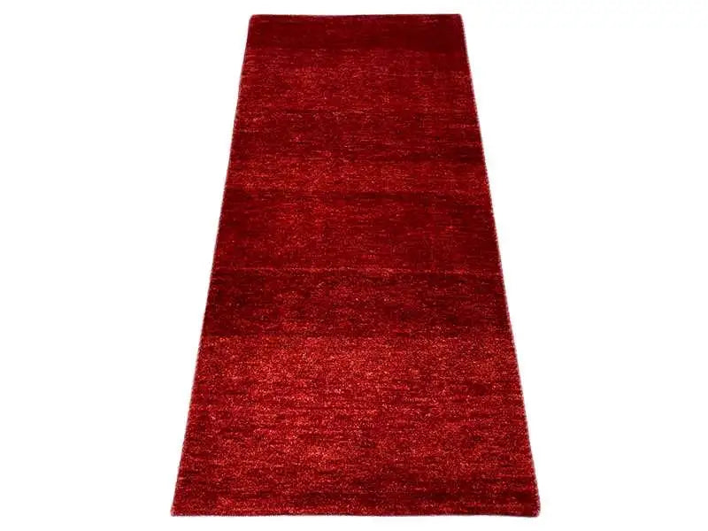 Gabbeh rug, burgundy red, elongated, mottled surface, 142×68 cm