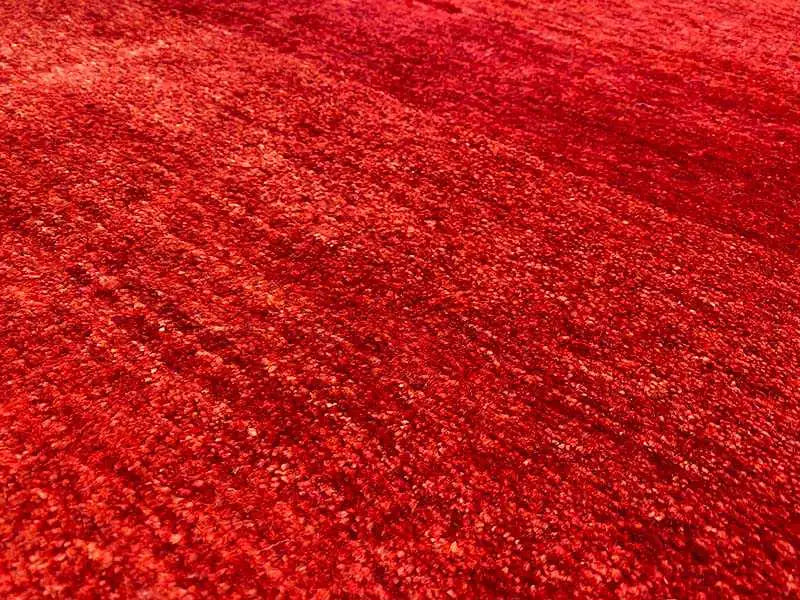 Red Gabbeh rug, close-up of the fine pile texture