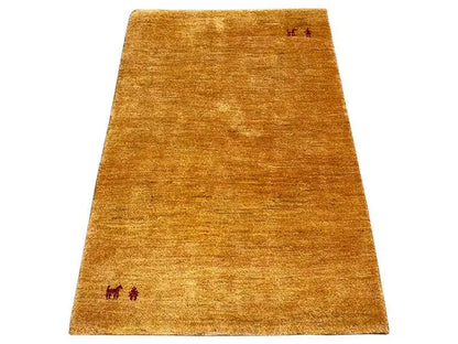 Gabbeh rug 124x81 cm mustard yellow with red animal and symbolic motifs