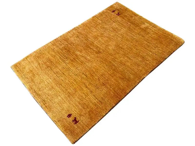 Rectangular mustard-yellow Gabbeh rug, diagonally patterned with red symbols