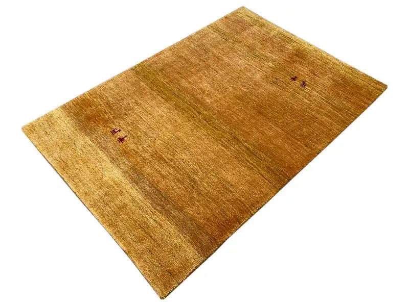 Gabbeh rug (151x100 cm), ochre brown, diagonally oriented, subtle small red-and-black motifs