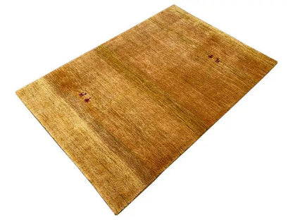 Gabbeh rug (151x100 cm), ochre brown, diagonally oriented, subtle small red-and-black motifs