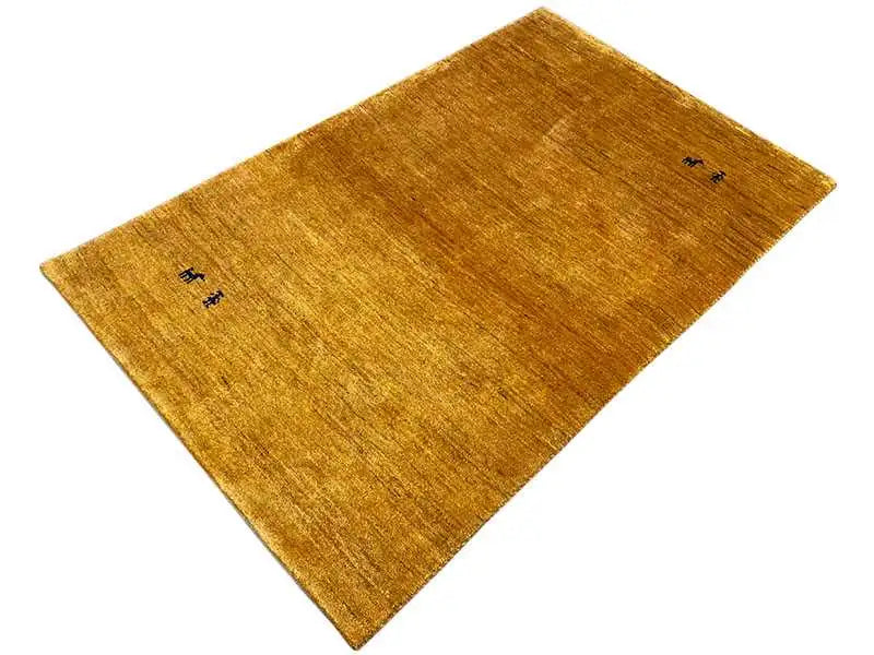 Ochre gabbeh rug with dark symbols, low-pile, rectangular