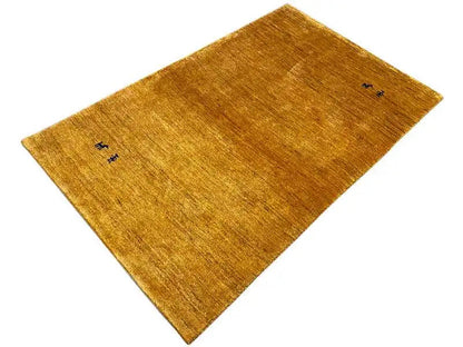 Ochre gabbeh rug with dark symbols, low-pile, rectangular