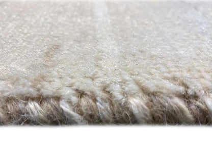 Gabbeh rug: close-up of the pile surface, light beige with dark nuances