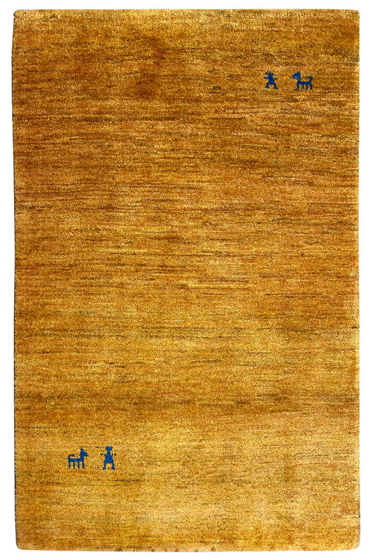 Rectangular gabbeh rug, golden brown with small blue motifs