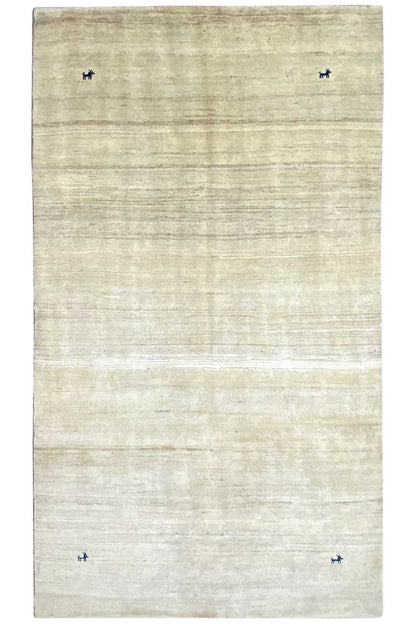 Cream-colored rug with simple lines; small blue markings at the corners