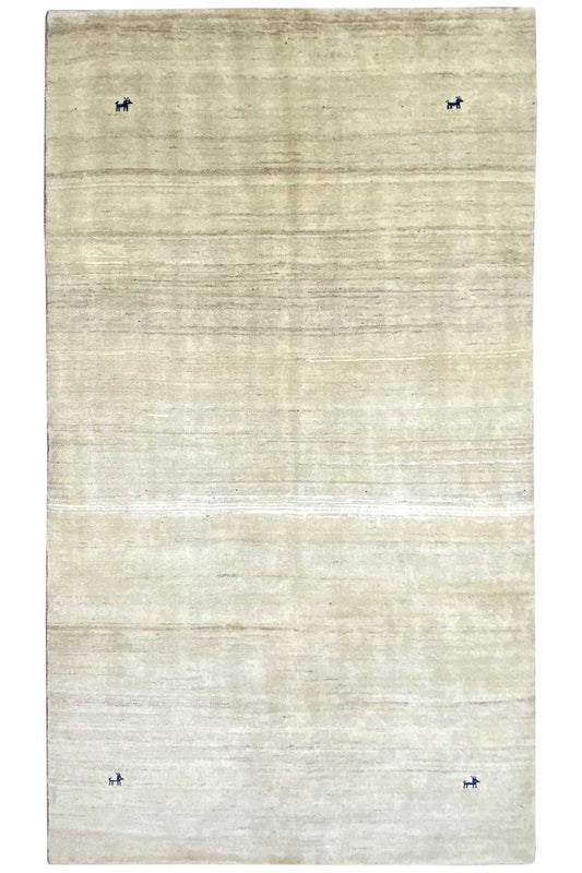 Cream-colored rug with simple lines; small blue markings at the corners