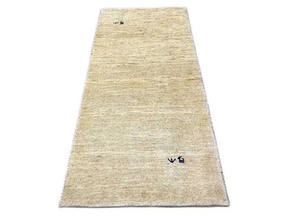 Gabbeh rug, beige, rectangular, fine woven texture, subtle blue markings
