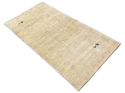 Gabbeh rug, beige, rectangular, photographed at an angle, flat-woven texture, blue dots