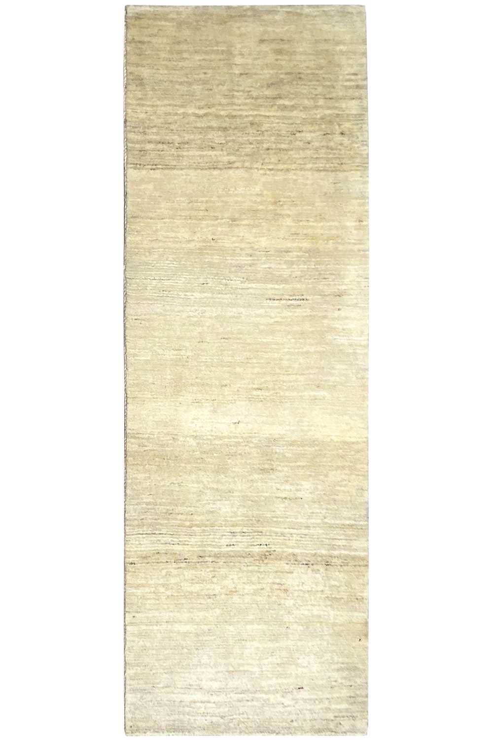 Rectangular Gabbeh rug in a light beige shade, laid flat