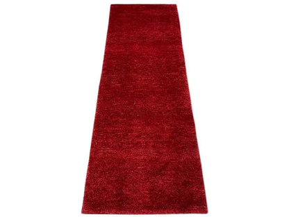 Gabbeh carpet runner, red pile, narrow rectangular with a straight edge