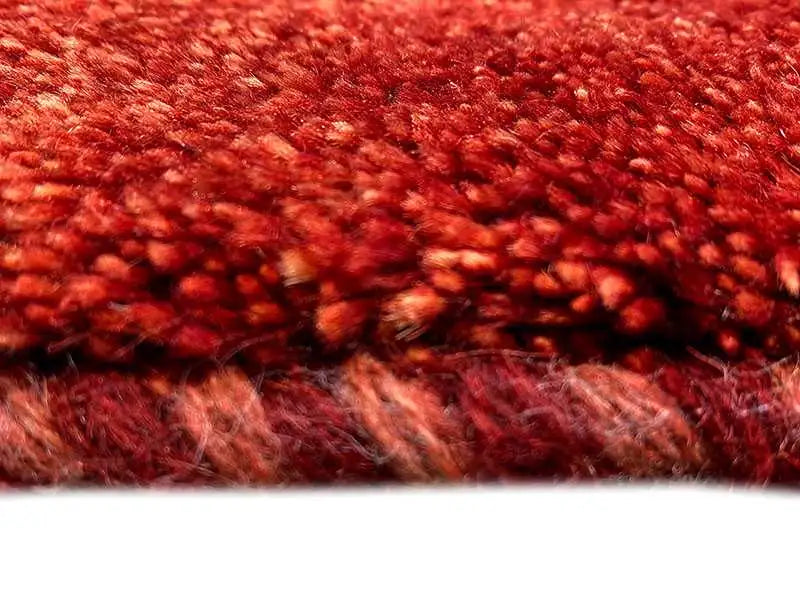 Gabbeh rug, red pile in detail, fine texture and shading