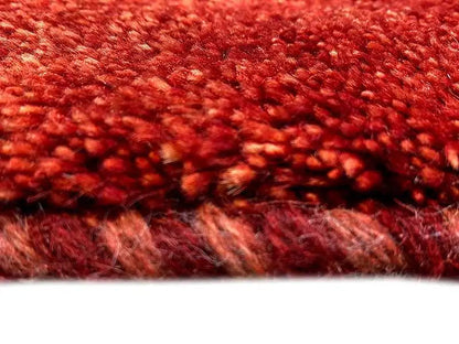 Gabbeh rug, red pile in detail, fine texture and shading
