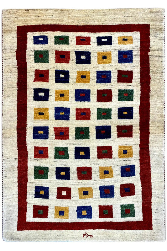 Gabbeh rug, appearing square: cream with a red border and colorful square panels