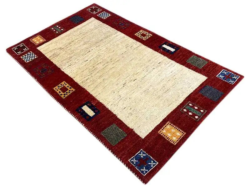 Gabbeh rug in red and beige, square ornaments at the corners, 163×104 cm