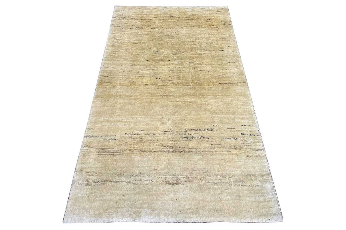 Runner-style Gabbeh rug in natural beige with a fine, even weave.